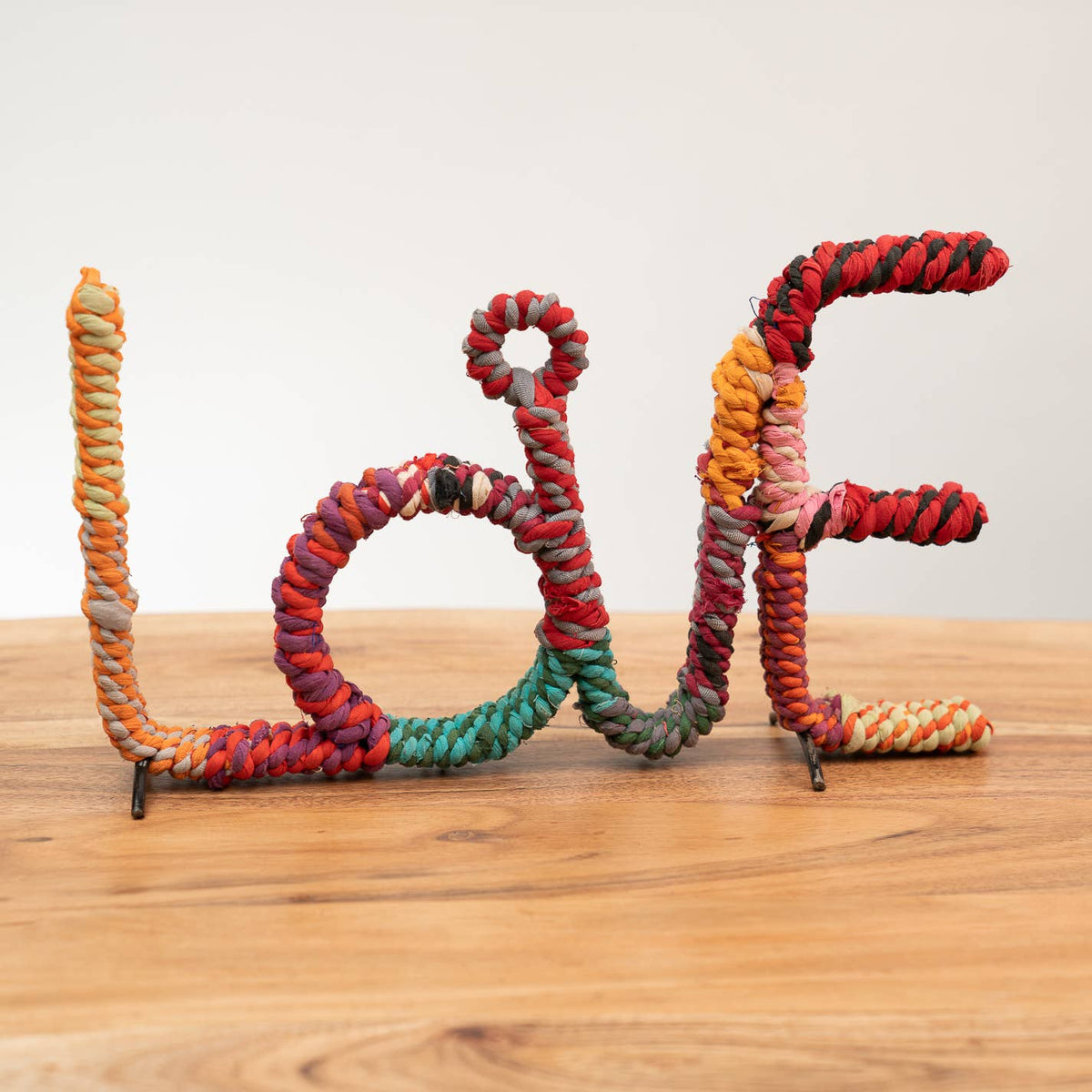 Handmade Colorful Jute LOVE Sign – One-of-a-Kind Boho Home Décor