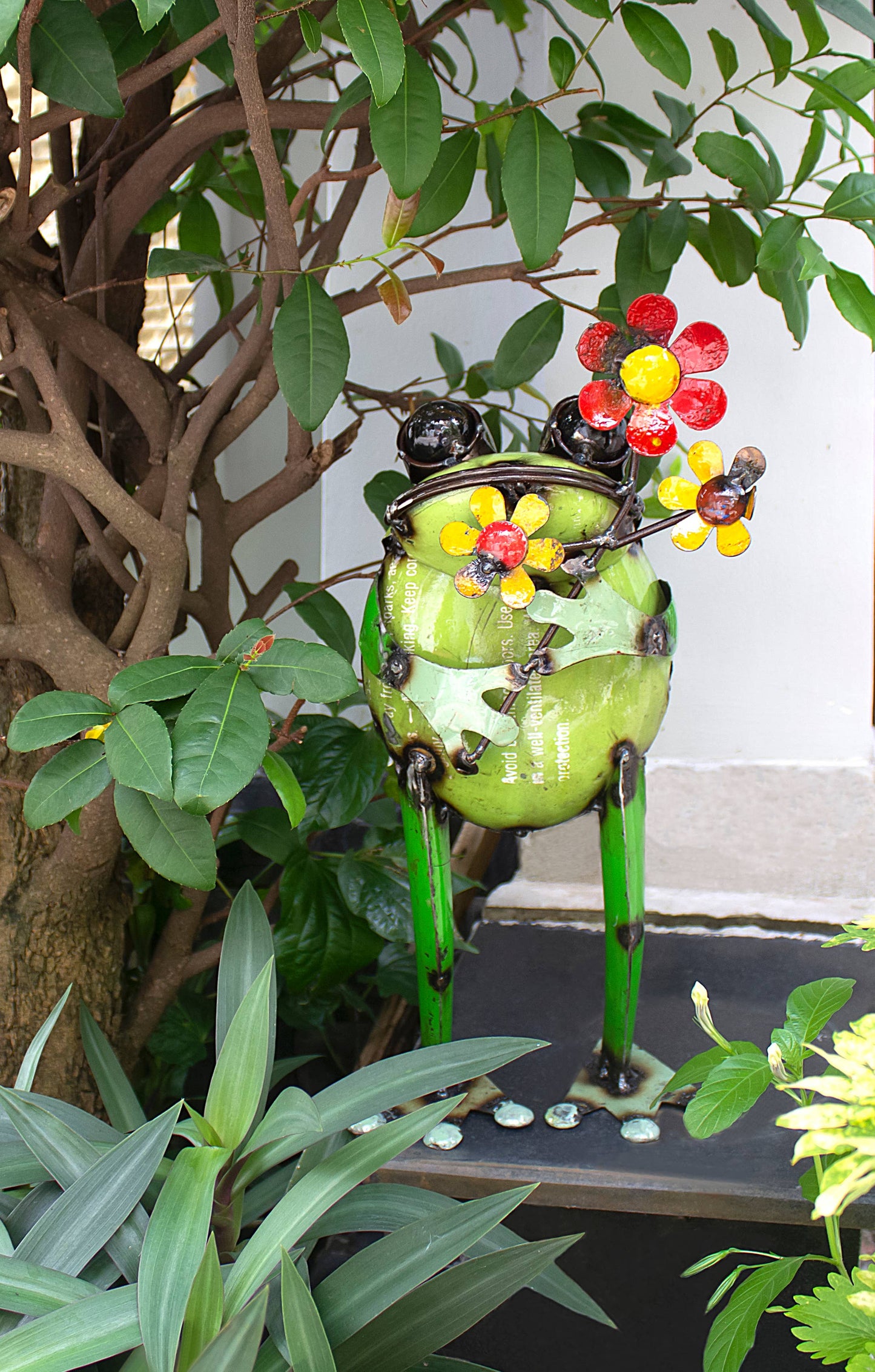Iron standing frog with flower